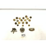 QUANTITY OF MILITARY BRASS BUTTONS AND THREE CAP BADGES.