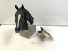 A BLACK CERAMIC BUST OF A HORSE AND A SMALL HORSE WALL PLAQUE