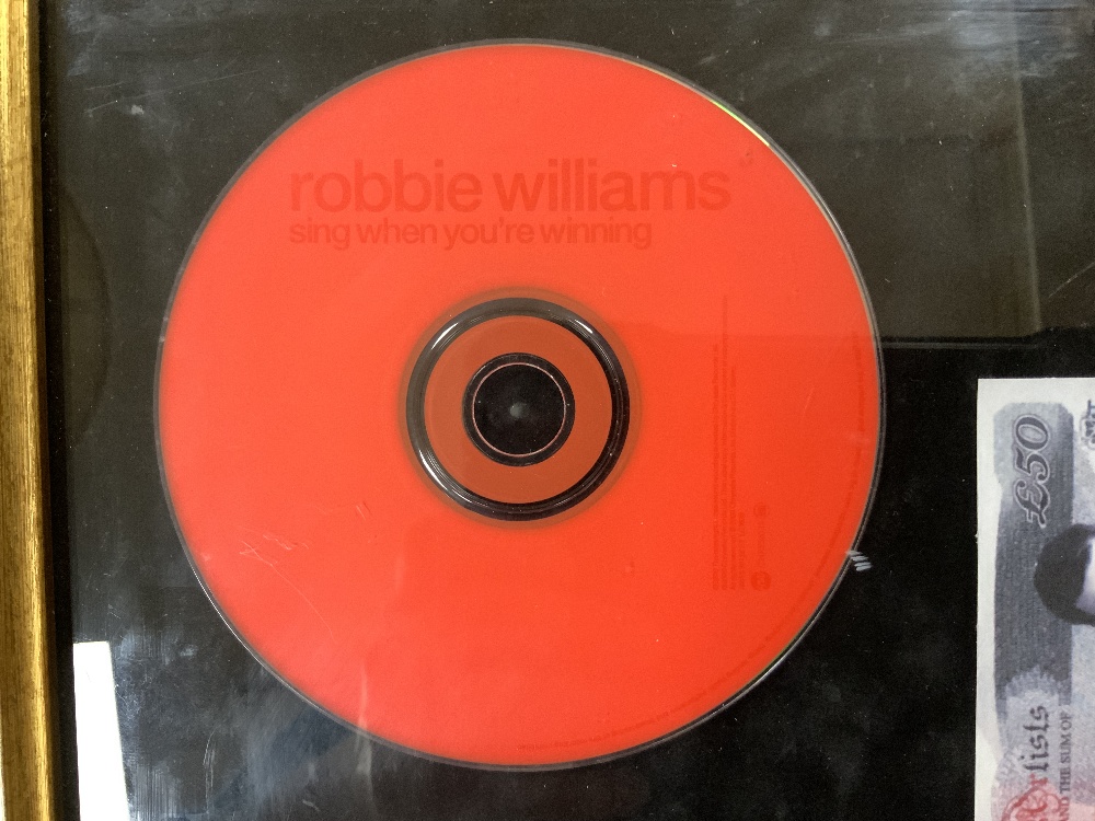 A ROBBIE WILLIAMS LTD EDITION CD- SING WHEN YOUR WINNING, AND A ROBBIE WILLIAMS £50 NOTE. - Bild 2 aus 6