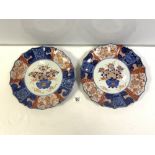 A PAIR OF JAPANESE IMARI CIRCULAR WALL PLATES (ONE WITH REPAIR TO RIM) 30 CM