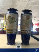 PAIR OF LARGE DOULTON WITH SLATERS GLAZED STONEWARE BALUSTER VASES DECORATED PANELS OF LEAVES BY L B
