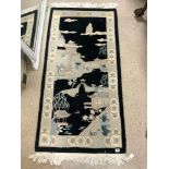 A MODERN BLACK CHINESE RUG