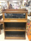 A LATE VICTORIAN WALNUT OPEN AND CLOSED GLAZED TOP DWARF BOOKCASE. 91 X 30 X 134 CMS.