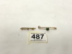 A 9CT HALLMARKED BAR BROOCH SET WITH SEED PEARL,1.1 GRAMS, AND A YELLOW METAL BAR BROOCH SET WITH