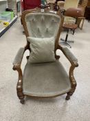 ANTIQUE BUTTON BACK ARMCHAIR WITH ORIGINAL CASTORS WITH SCROLL ARMS