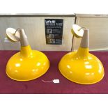 A PAIR OF 1960S YELLOW ENAMELLED PENDANT LIGHTS