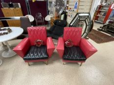 A PAIR OF 1950"S\ 1960"S RETRO RED AND BLACK REXINE COVERED ARMCHAIRS.