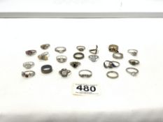 TWENTY TWO MIXED SILVER AND METAL RINGS VARIOUS.