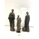 THREE RESIN BRONZED FINISH FIGURES OF A MAASAI WOMAN WITH GOATS AND A BABY 38CM TALLEST
