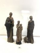 THREE RESIN BRONZED FINISH FIGURES OF A MAASAI WOMAN WITH GOATS AND A BABY 38CM TALLEST