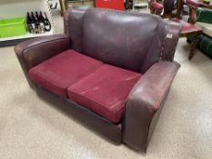 VINTAGE LEATHER TWO SEAT SOFA IN OX BLOOD RED WITH STUD WORK
