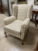 MODERN WING BACK ARMCHAIR ON BALL AND CLAW FEET WITH A CHECKERED DESIGN