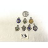 EIGHT HALLMARKED SILVER SPORTING PENDANTS - FIVE WITH ENAMEL, THREE FOOTBALL, TWO CRICKET, ONE