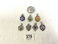 EIGHT HALLMARKED SILVER SPORTING PENDANTS - FIVE WITH ENAMEL, THREE FOOTBALL, TWO CRICKET, ONE