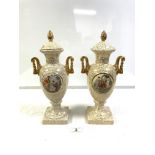 A PAIR OF ART DECO GILT DECORATED URN-SHAPED TWO-HANDLED VASES AND COVERS, WITH CLASSICAL MAIDEN