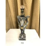 EGYPTOLOGY RESIN FIGURAL PIECE DECORATED WITH SNAKES STAND AND SWORD