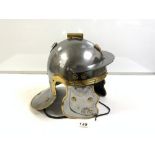 A BRASS AND STEEL ROMAN IMPERIAL GAUL RE-ENACTMENT HELMET