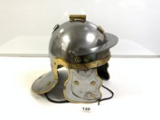 A BRASS AND STEEL ROMAN IMPERIAL GAUL RE-ENACTMENT HELMET