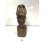 A CARVED HARDWOOD FIGURE OF AN AFRICAN TRIBESWOMEN, 40CM HIGH