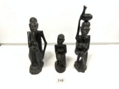 THREE CARVED WOODEN FIGURES LARGEST 35CM
