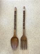 LARGE WOODEN FORK AND SPOON, CARVED HANDLES, 107CMS