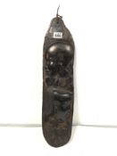 CARVED WOODEN PLAQUE OF A GIRL AND BOY, 58CMS