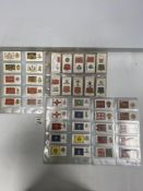QUANTITY OF 20 SLEEVES, PLAYERS CARDS, MILITARY, DRUM BANNERS AND CAP BADGES, REGIMENTAL STANDARDS