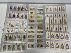 QUANTITY OF 110 SLEEVES WILLS CARDS, (SPEED, DOGS, ENGLISH PERIOD COSTUME, CINEMA STARS, MODERN