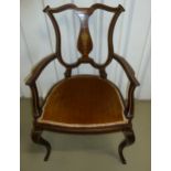 An Edwardian mahogany occasional chair with satinwood stringing, inlaid decoration on the back