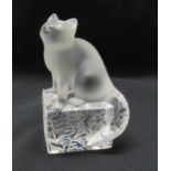 Lalique crystal figurine of a cat on a raised rectangular base, signed to the base, 13.5cm (h)