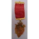 9ct gold Masonic jewel with red ribbon, approx total weight 21.6g