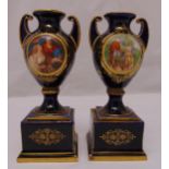 A pair of Vienna baluster vases blue ground with scenes of courting couples and gilded decoration on