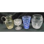 A quantity of glass to include a Scottish cut glass vase, a Bohemian cut glass vase overlaid with