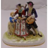 A continental porcelain figural family group with a bird and a bird cage on oval naturalistic