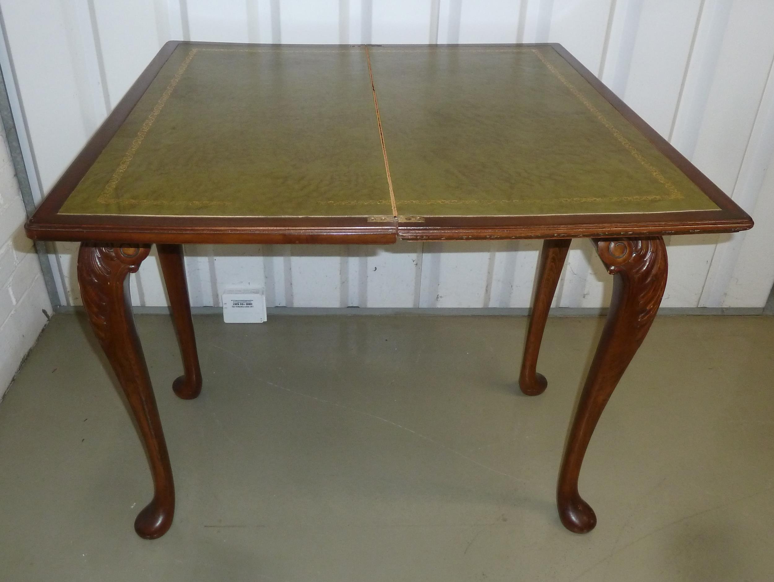 An Edwardian rectangular mahogany games table with gadrooned border on four leaf capped scroll legs, - Image 2 of 2