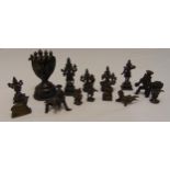 A quantity of oriental bronze miniature figurines of various styles and sizes (14)