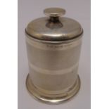 A hallmarked silver engine turned cigarette caddy of cylindrical form, the pull off cover with spool