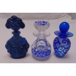 Three dressing table scent bottles with drop stoppers of various size and shape, tallest 16.5cm (h)