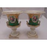 A pair of continental campagna form vases decorated with flowers on raised square bases, 34cm (h)