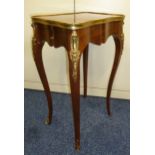 A French occasional table shaped rectangular with applied brass mounts, single drawer on four