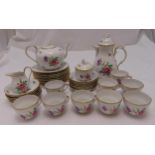 A Dresden tea and coffee set decorated with floral sprays and gilded borders to include a coffee