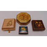 Four 20th century lacquered wooden musical boxes of varying sizes, decorated with flowers and