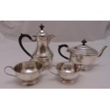 An Irish hallmarked silver four piece teaset, shaped circular with moulded borders to include a