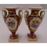 A pair of Atelier le Tallec vases on square bases with rams head side handles, marks to the base,