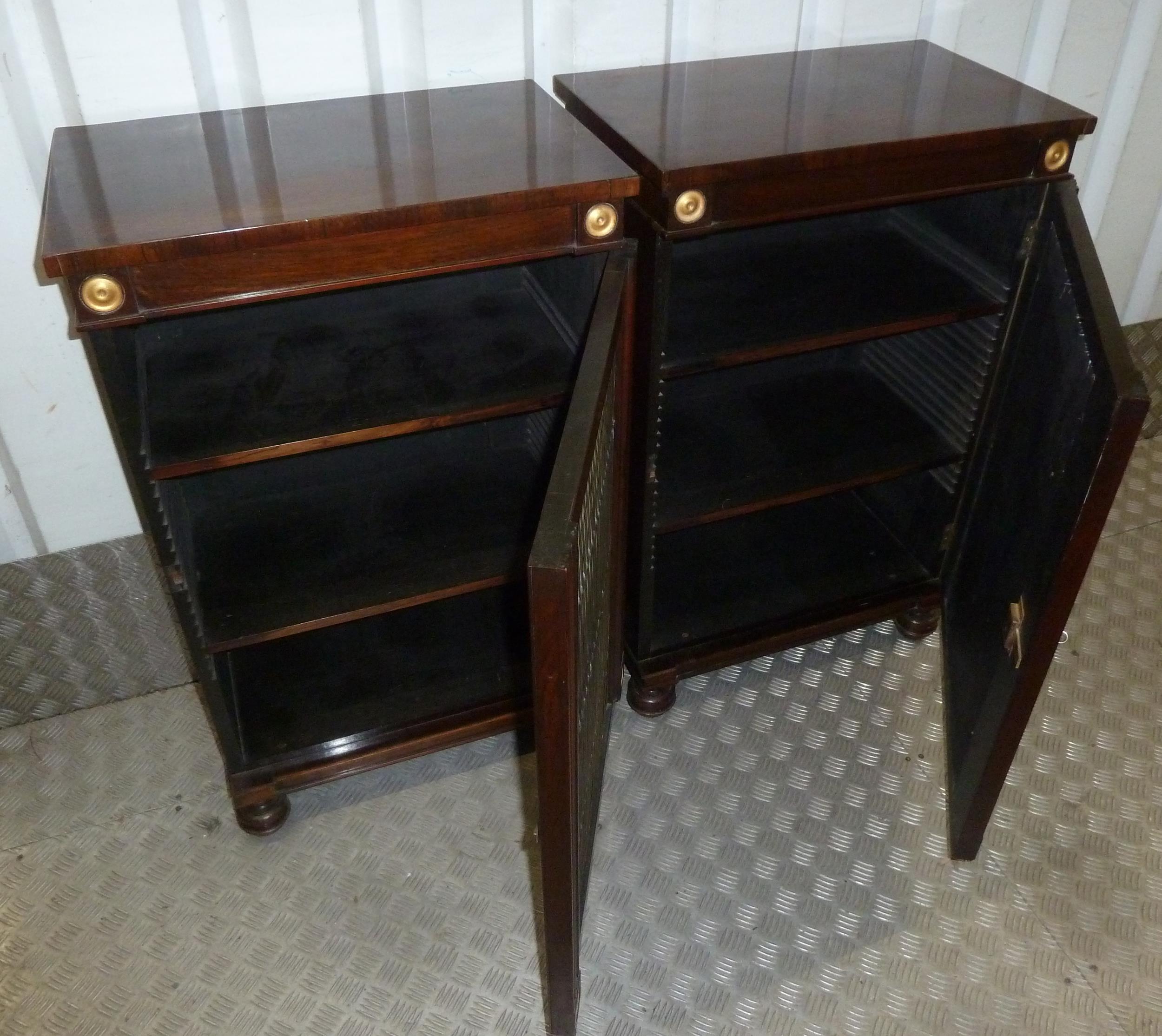 A pair of Regency mahogany rectangular cabinets with hinged doors on four turned bun feet, 88 x 56 x - Image 2 of 2