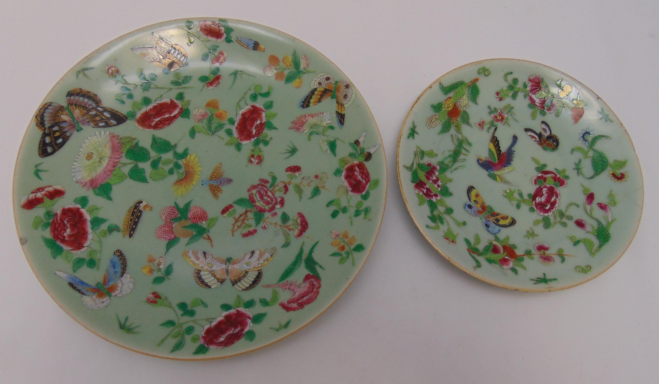A late 19th century Chinese Famille Rose plate decorated with butterflies, flowers and leaves and