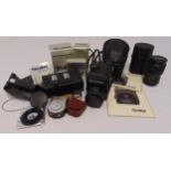 Rolleiflex SL2000 F camera in leather pouch and a quantity of Rollei accessories to include a Rollei