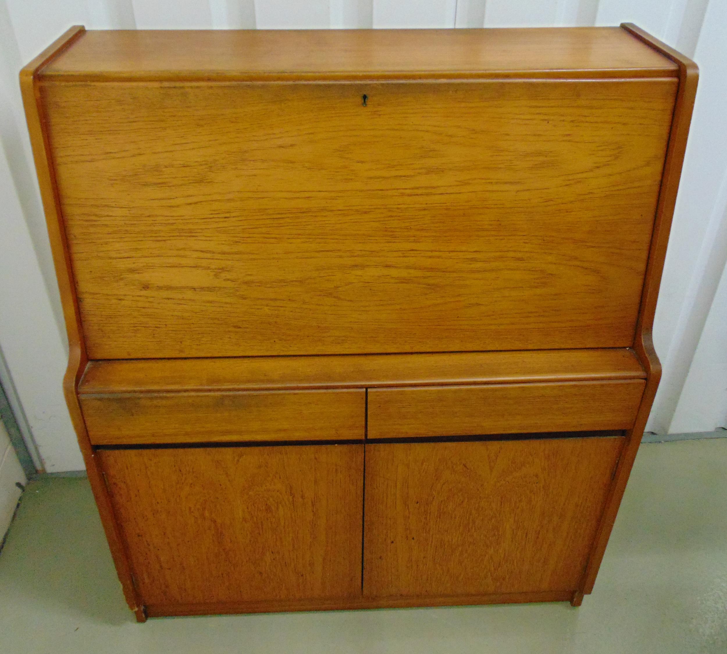 Remploy mid 20th century rectangular teak bureau, the drop flap revealing fitted interior above