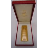 Must de Cartier gold plated cigarette lighter in original packaging