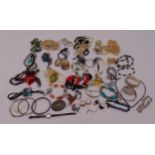 A quantity of costume jewellery to include necklaces, bangles, rings and a watch